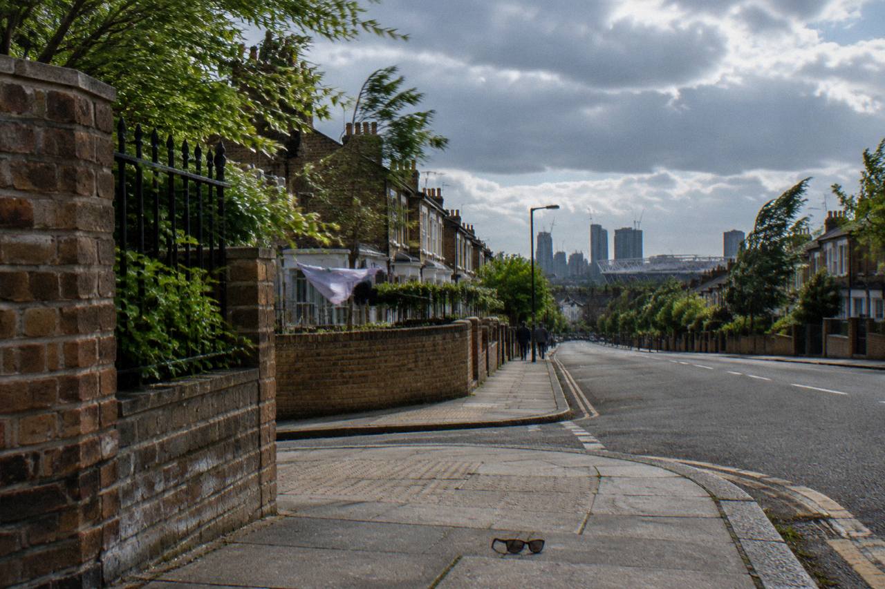 Stock brick terraces under fast clouds in Forest Gate, east London, on a windy day