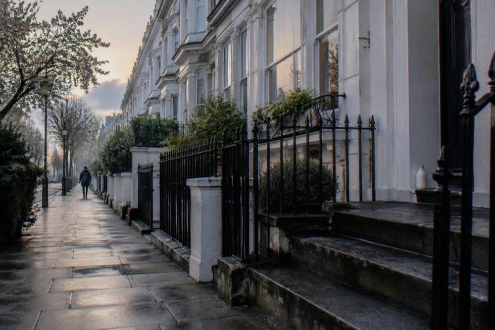 A Victorian terrace street in west London with stucco facades and tall windows