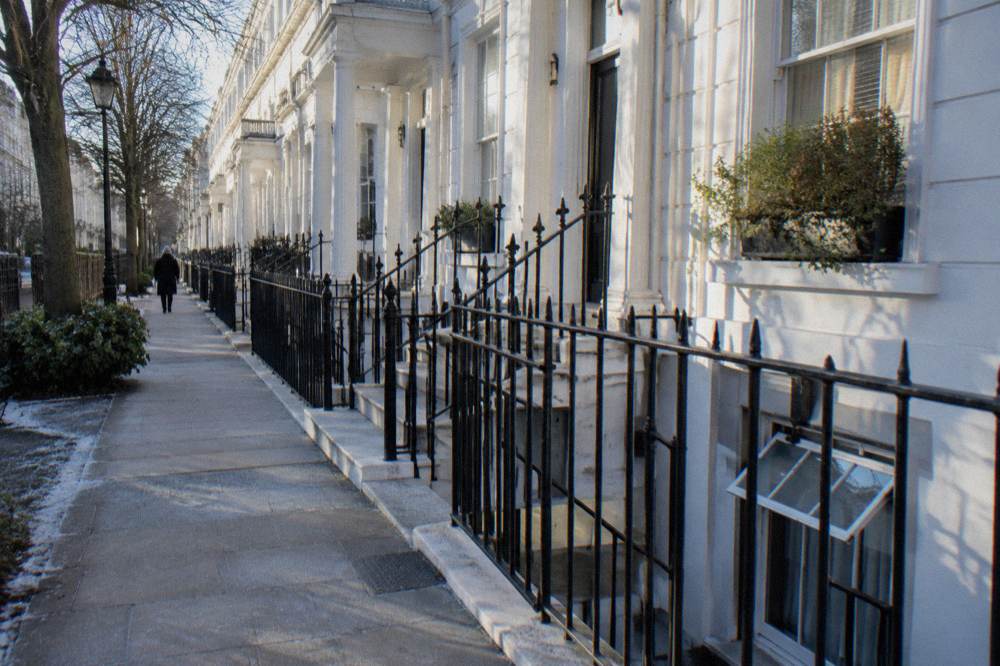 A Victorian terraced street in Pimlico with white stucco facades